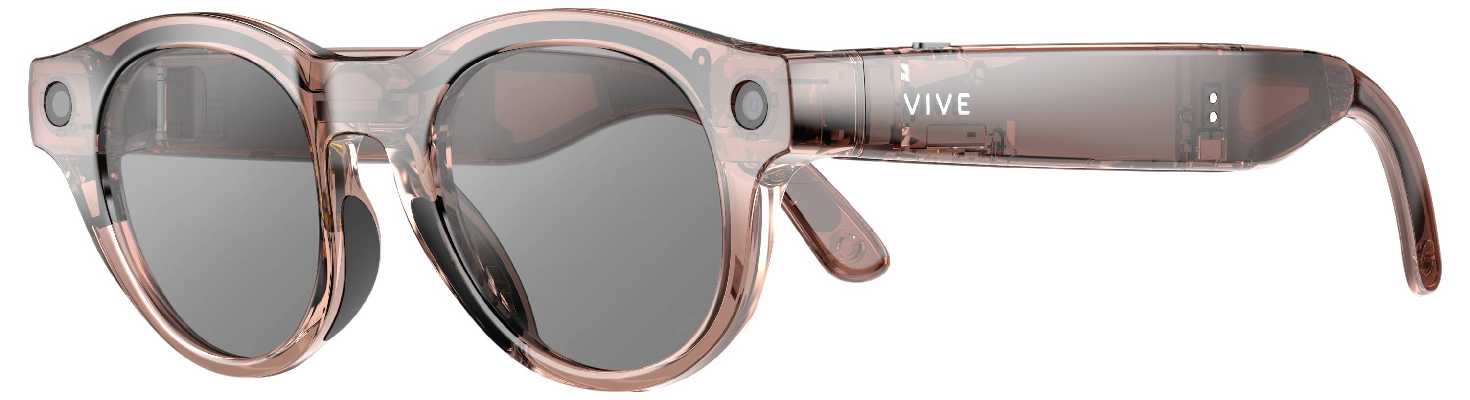 Rosa durchscheiniges VIVE Virtual-Reality-Headset mit dunklen Linsen und dicken Seitenbügeln, auf weißem Hintergrund dargestellt.