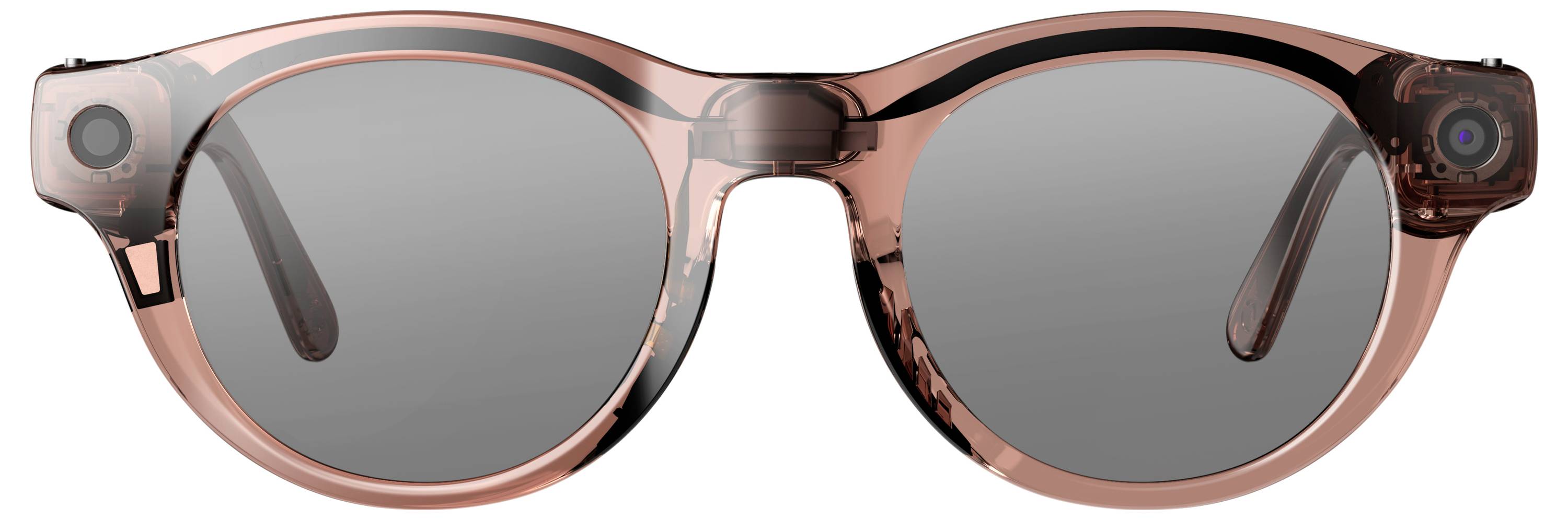 Rosa durchscheinende Smart-Sonnenbrille mit eingebauten Kameras an beiden Bügeln und dunklen Gläsern, Frontalansicht auf weißem Hintergrund.