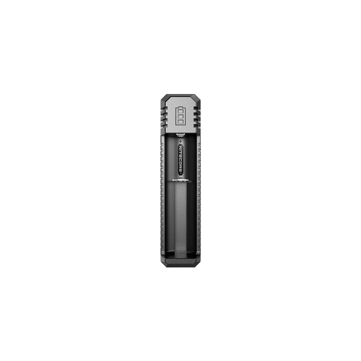 Ein schwarzes zylindrisches Batteriladegerät oder Batteriehalter mit einem Batteriesymbol in der Nähe der Oberseite, zentriert auf einem schlichten weißen Hintergrund dargestellt.