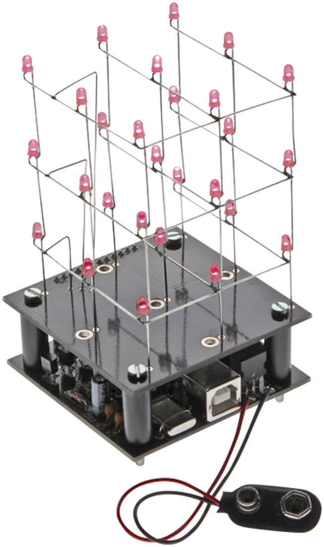 'Eine LED-Würfel-Anordnung auf einer Schaltungsplatine, bestehend aus mehreren rot leuchtenden LEDs, die in einem 3x3x3 Raster angeordnet sind.'