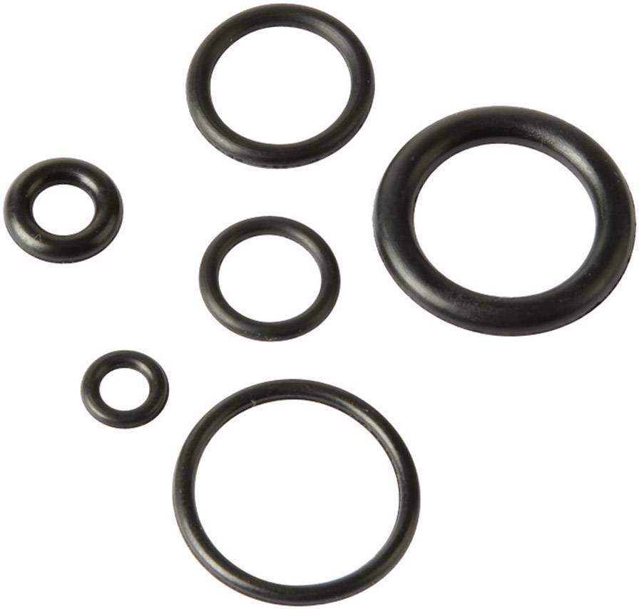 Mehrere schwarze O-Ringe unterschiedlicher Größe liegen auf einer weißen Oberfläche.