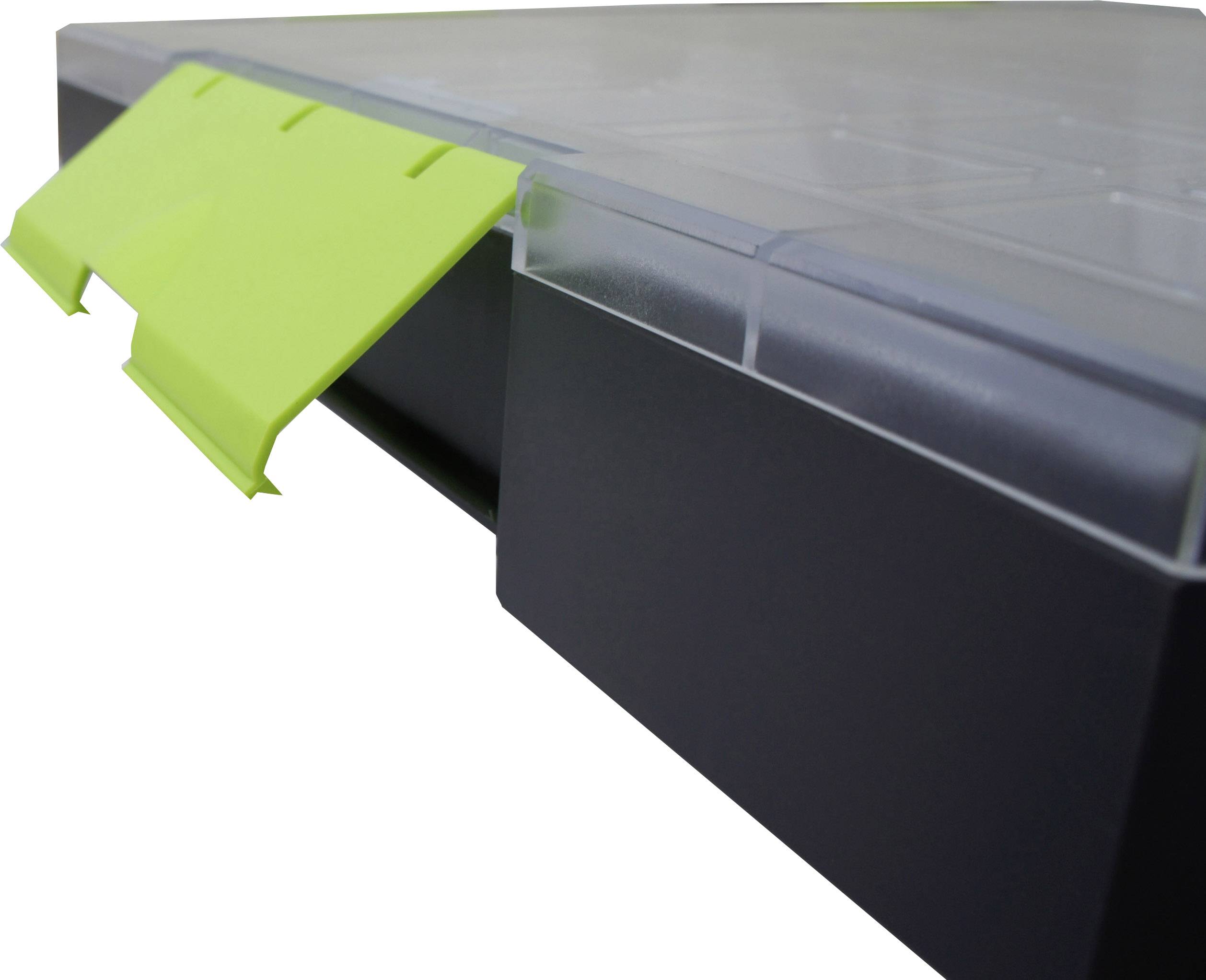 Grüner Plastikverschluss an der Ecke einer transparenten Kunststoffbox, die sich von einem schwarzen, undurchsichtigen Bereich abhebt.