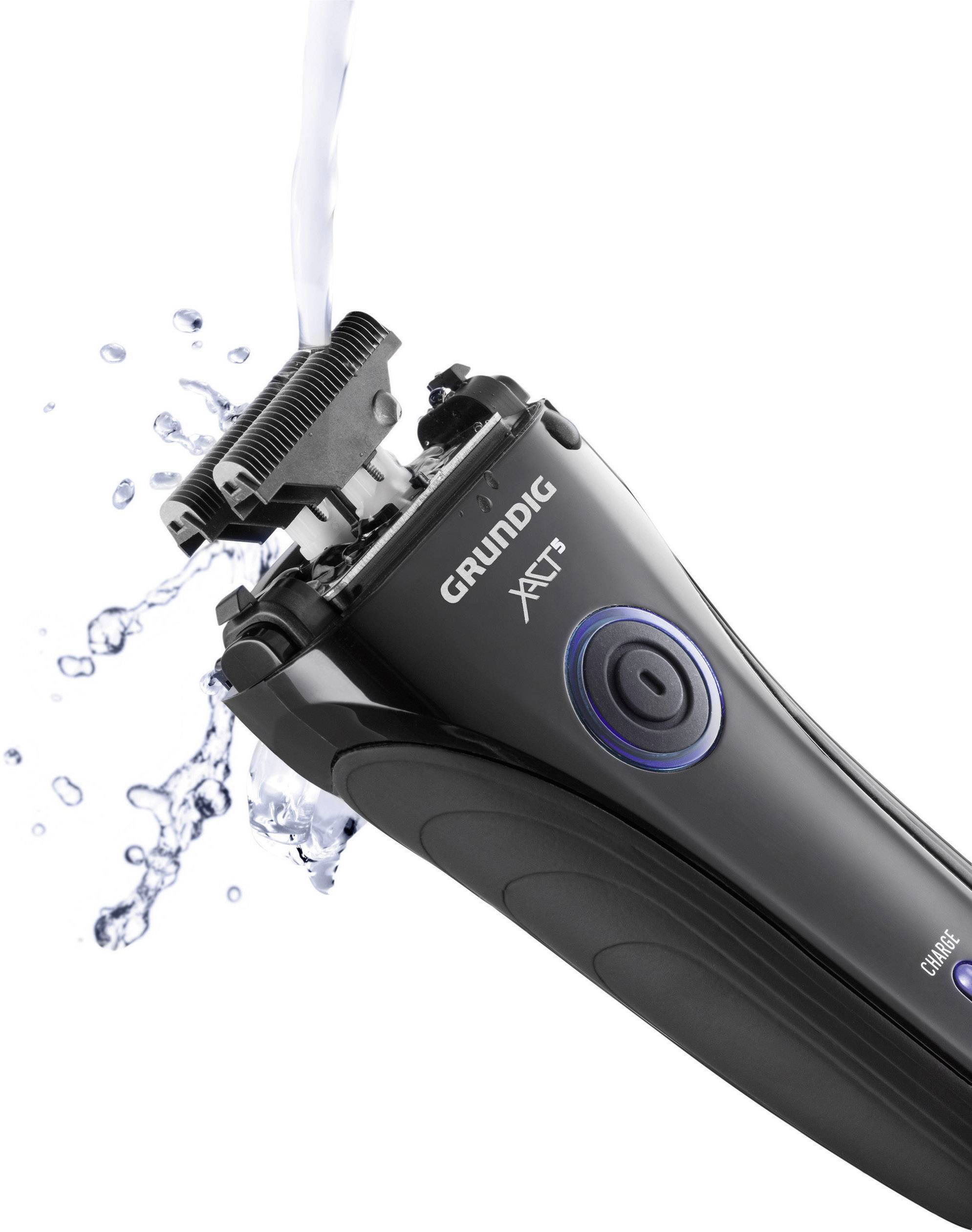 Elektrischer Rasierer mit fließendem Wasser zur Reinigung, Markenname 'Grundig', schwarzes Gehäuse, Ansicht der Scherköpfe.