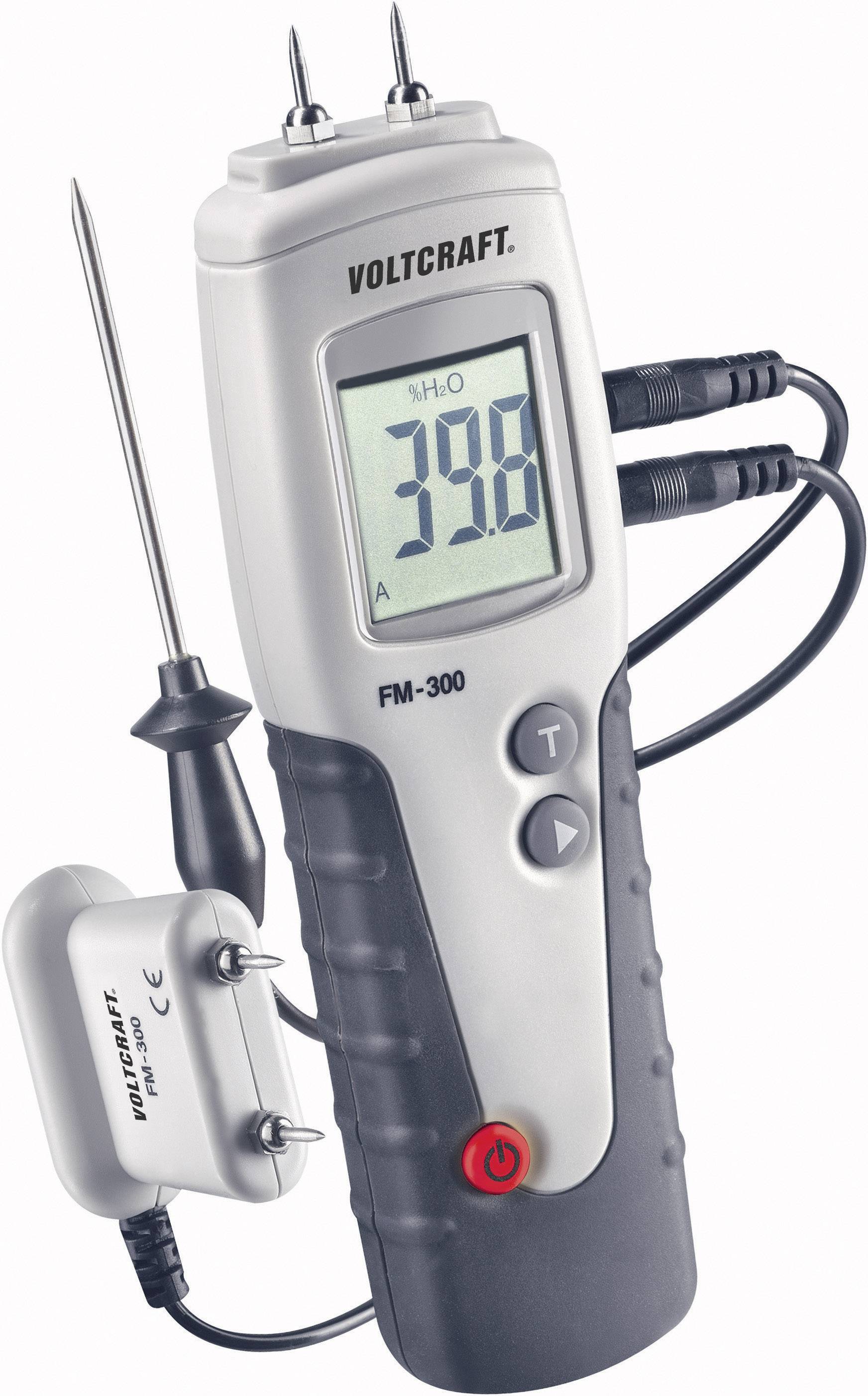 Ein digitales Messgerät der Marke Voltcraft, Modell FM-300, zeigt die Temperatur von 39,8 Grad auf einem Display an.