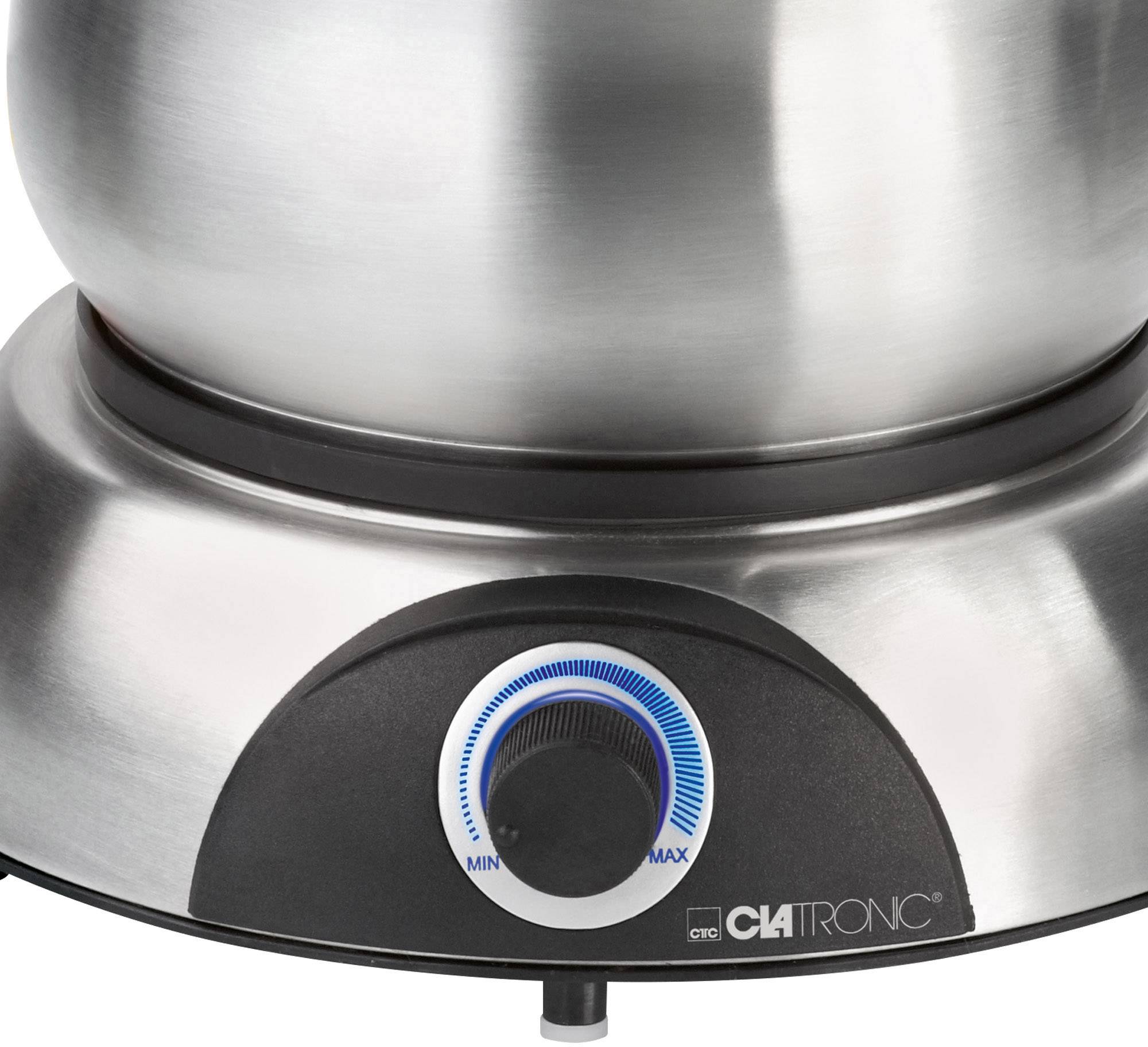 Unterseite eines silbernen Küchengeräts mit Drehknopf zur Kontrolle der Geschwindigkeit, markiert mit 'MIN' und 'MAX'.
