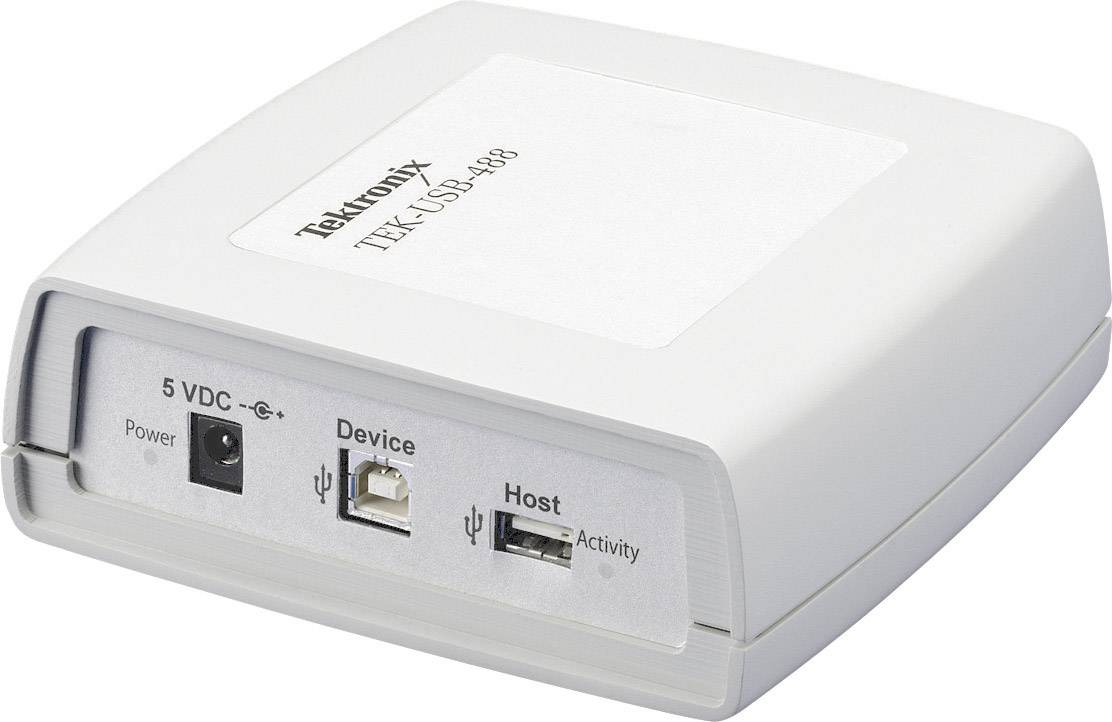 Ein weißes Gerät mit der Aufschrift 'Tektronix TPI4USB-488', Anzeigeleuchten für Power und Aktivität, sowie Anschlüsse für 5 VDC, Device und Host.
