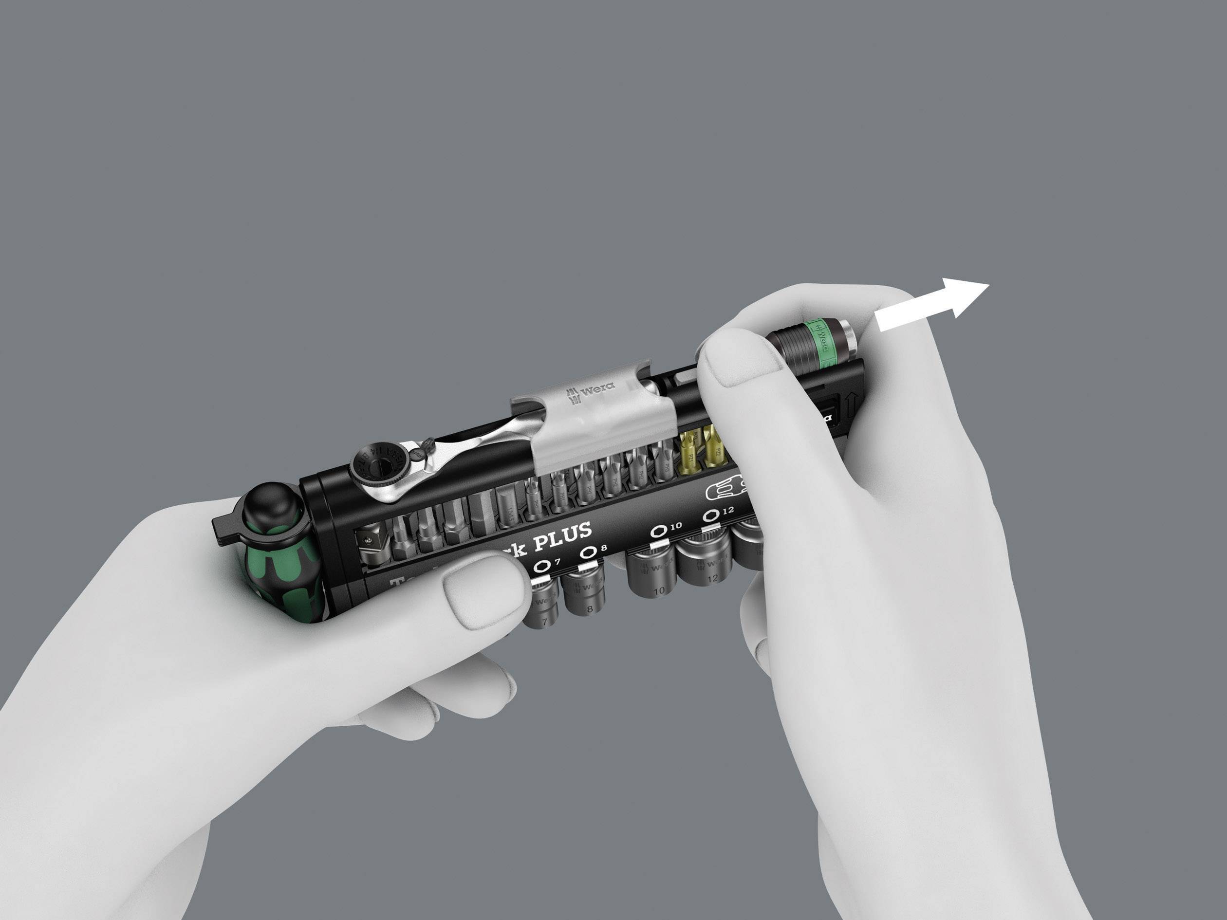 Hände halten ein Werkzeug-Set, drehen einen Ring auf einem Schraubenschlüssel, um die Größe anzupassen. Anzeige von Bits und Zubehör.