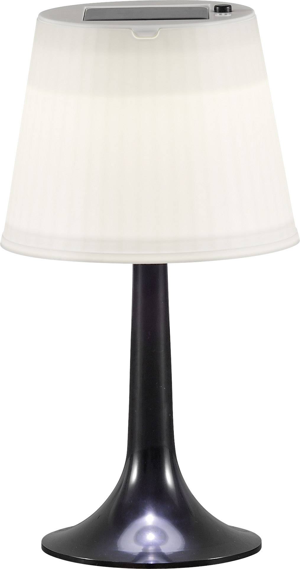 Eine kleine Tischlampe mit weißem, gefaltetem Lampenschirm auf einem schwarzen, glänzenden Fuß; moderne, minimalistische Ästhetik.