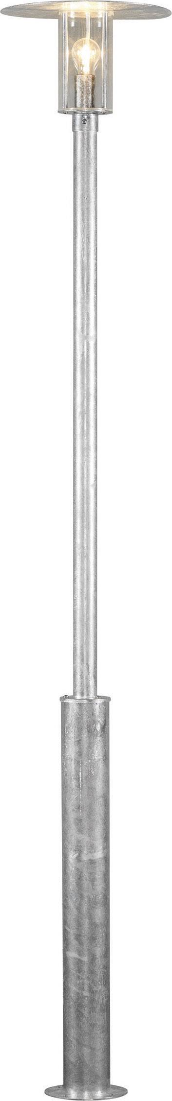 Eine moderne Stehlampe mit einem schlanken, metallischen Stahlrahmen und einem zylindrischen Lampenschirm aus Glas, beleuchtet.