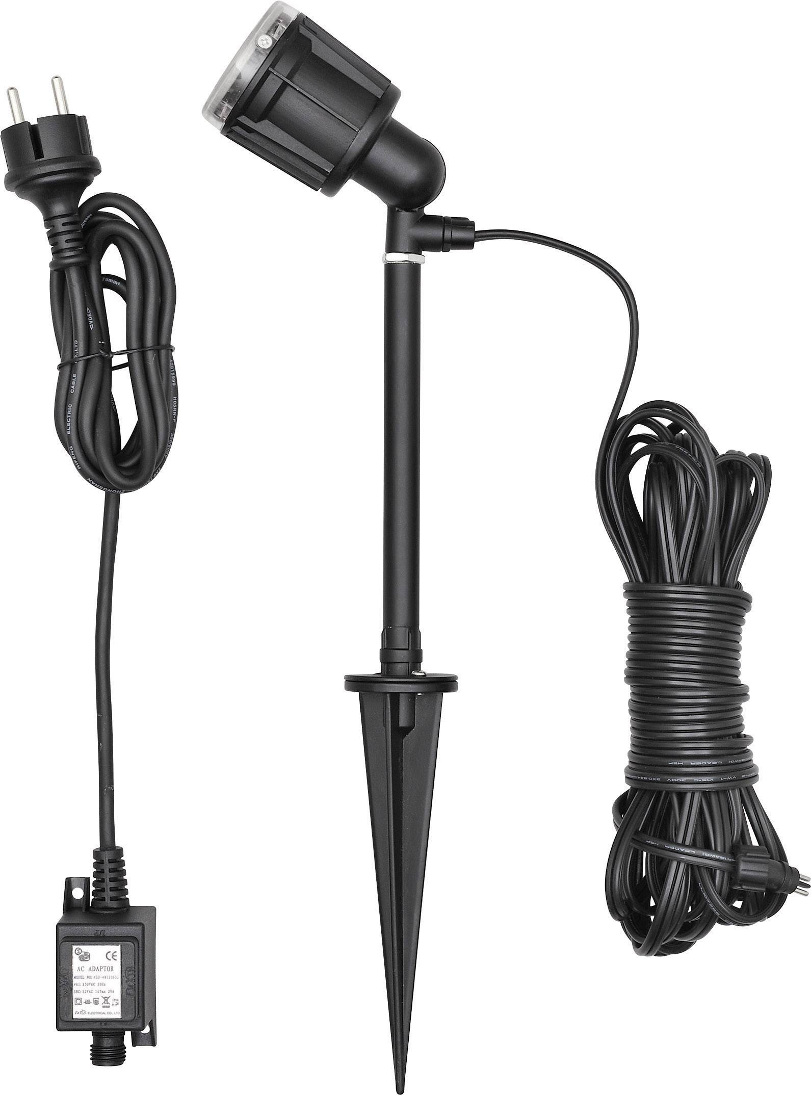 Spotleuchte mit Erdspieß und langem Kabel, geeignet für den Außenbereich. Enthält einen Stecker und einen Transformator.