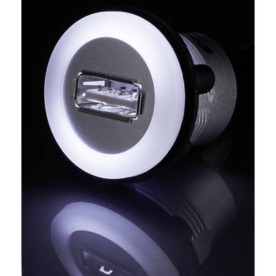 Ein leuchtender USB-Anschluss, der auf einer reflektierenden dunklen Oberfläche liegt. Das Licht erzeugt einen sanften Halo-Effekt.