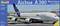 'Airbus A380 mit neuer Lackierung bei seinem Erstflug vor Hangars. Modellbausatz von Revell im Maßstab 1:144.'