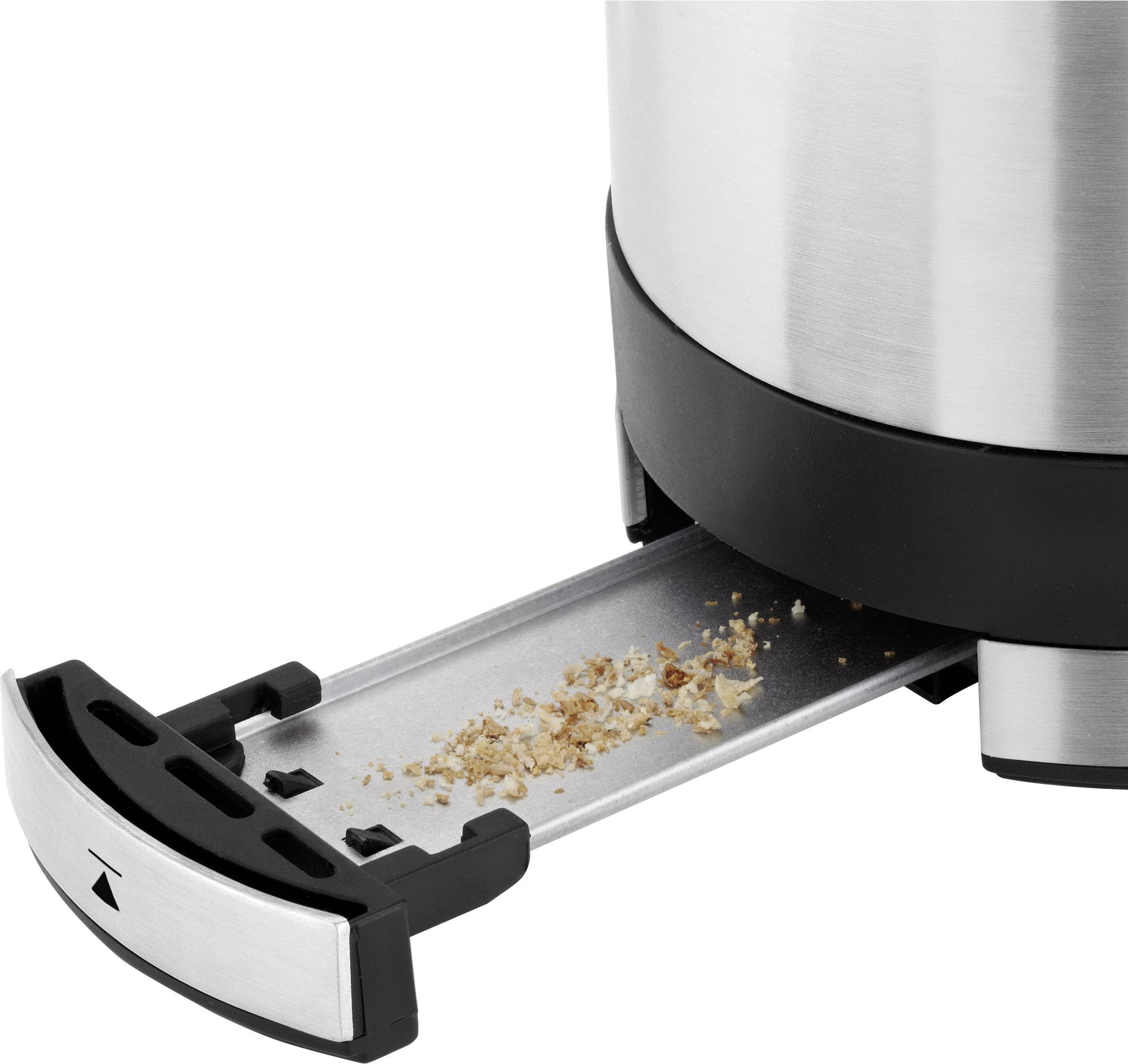Eine Krümelschublade ist zur Hälfte aus einem Edelstahl-Toaster herausgezogen und zeigt verstreute Brotkrümel.