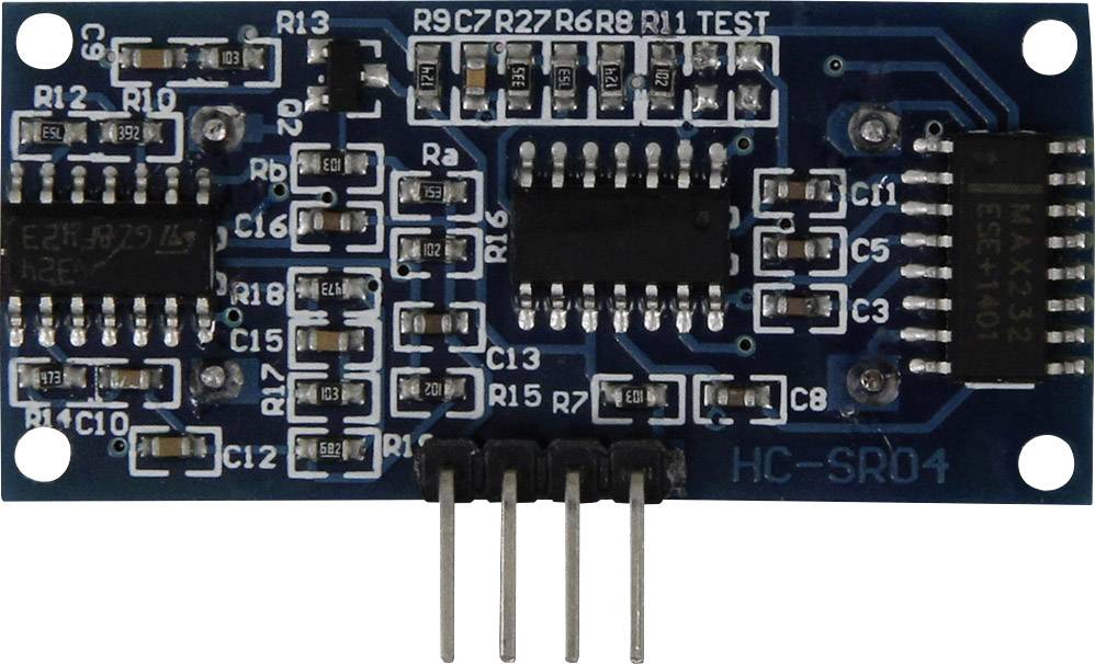 Elektronische Schaltung mit mehreren Bauteilen, darunter Widerstände und ICs, auf einer blauen Leiterplatte.