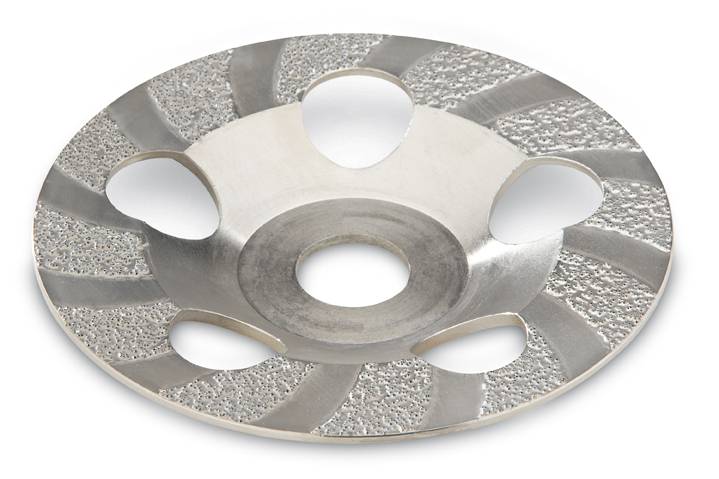 Silbernes Schleifrad mit runder, tellerförmiger Struktur und mehreren Aussparungen, die einen spiralförmigen Schliff zeigen.