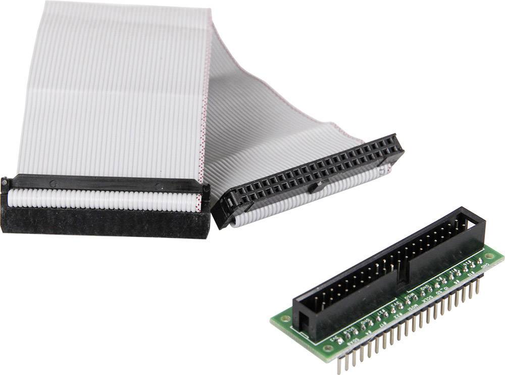 'Flachbandkabeladapter mit grüner Leiterplatte und zwei schwarzen Steckverbindern, die modulare elektronische Vernetzung ermöglichen.'