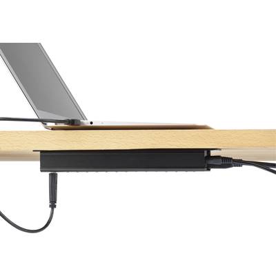 Ein Laptop ist am Rand eines Holztisches platziert. Unter dem Tisch sind Kabel ordentlich befestigt.