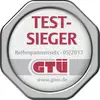 'Testsieger Reifepannensets 05/2017 GTÜ'. Prüfplakette der GTÜ für Reifenpannensets, datiert Mai 2017, zeigt das Logo und die Website.