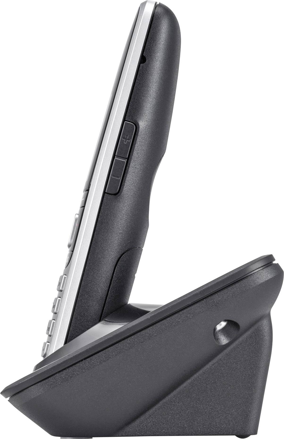 Schnurloses Telefon in einer Ladestation, seitliche Ansicht. Schwarz mit Tasten an der Seite, aufrecht stehend im Ladegerät.