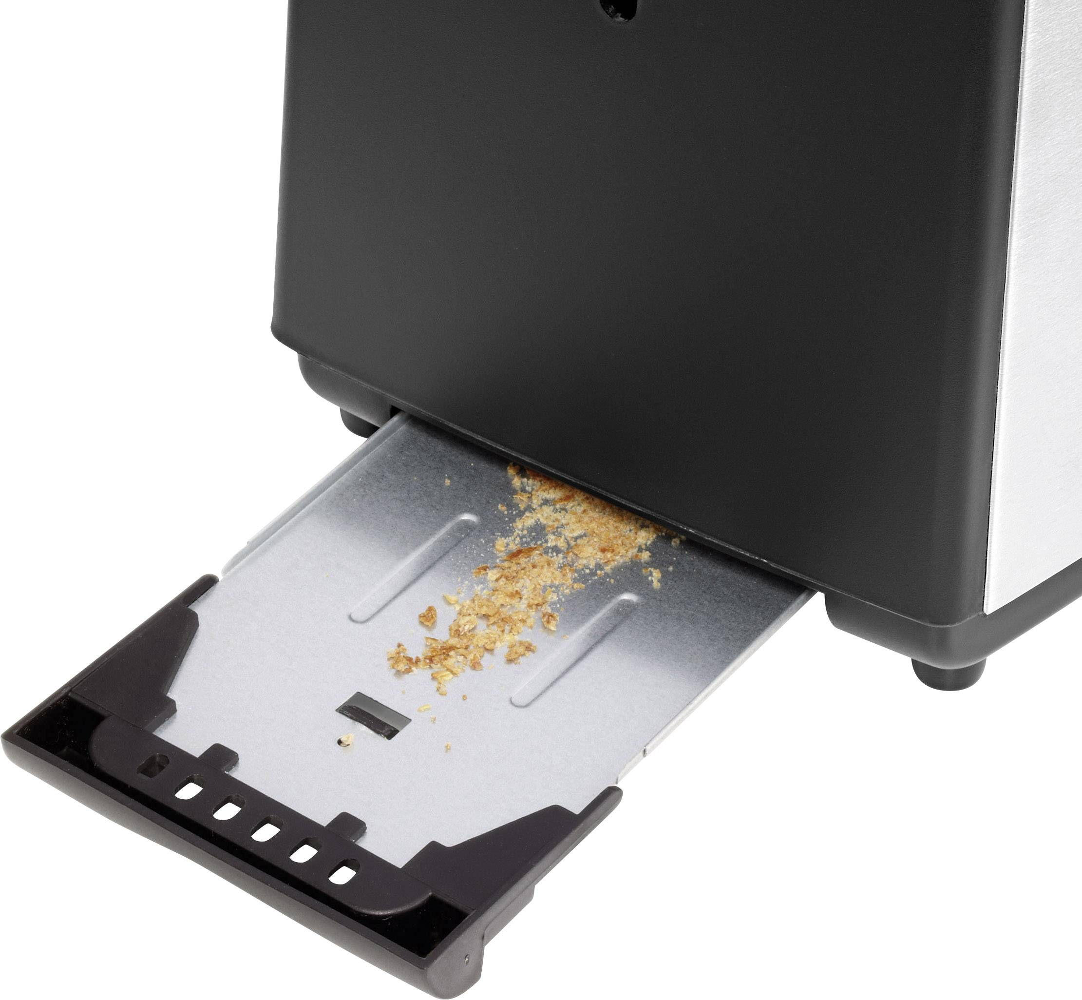 Toaster mit geöffnetem Krümelfach, mehrere Krümel sind sichtbar.