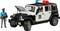 Ein Polizeiauto-Spielzeug mit geöffnetem Motorhaube und Lichtleiste. Daneben steht eine Polizisten-Figur mit Handschellen.