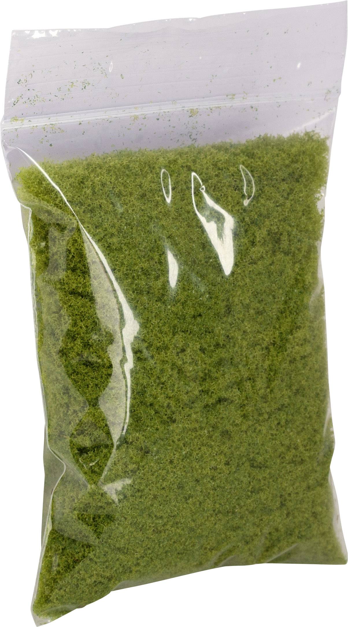 Grüner Streu im durchsichtigen Plastikbeutel.