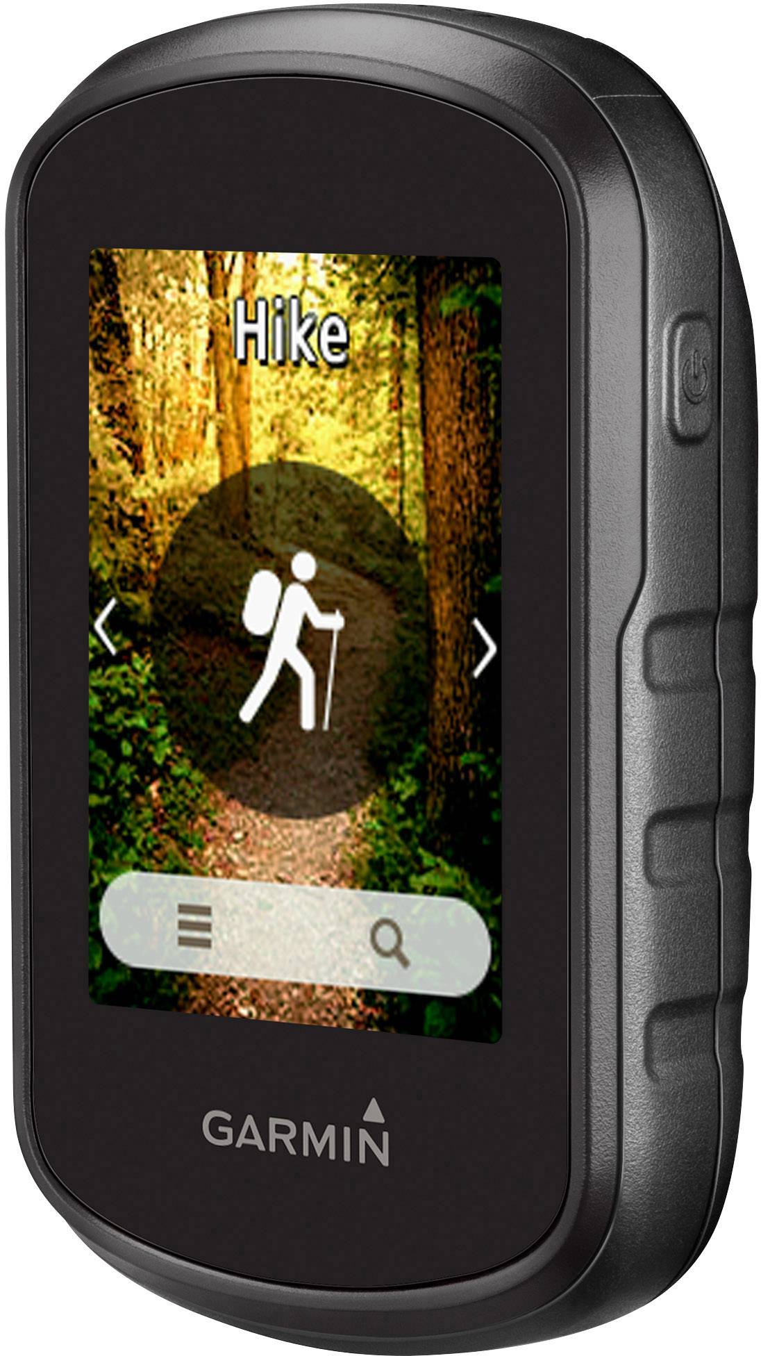 Ein GPS-Gerät mit einem farbigen Display zeigt einen Wanderweg im Wald. Das Wort 'Hike' und ein Wanderer-Symbol sind sichtbar.