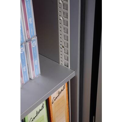 Ein Metallregal mit Computerkassetten oben und bunten Ordnern im unteren Bereich, die mit 'Contract' beschriftet sind.