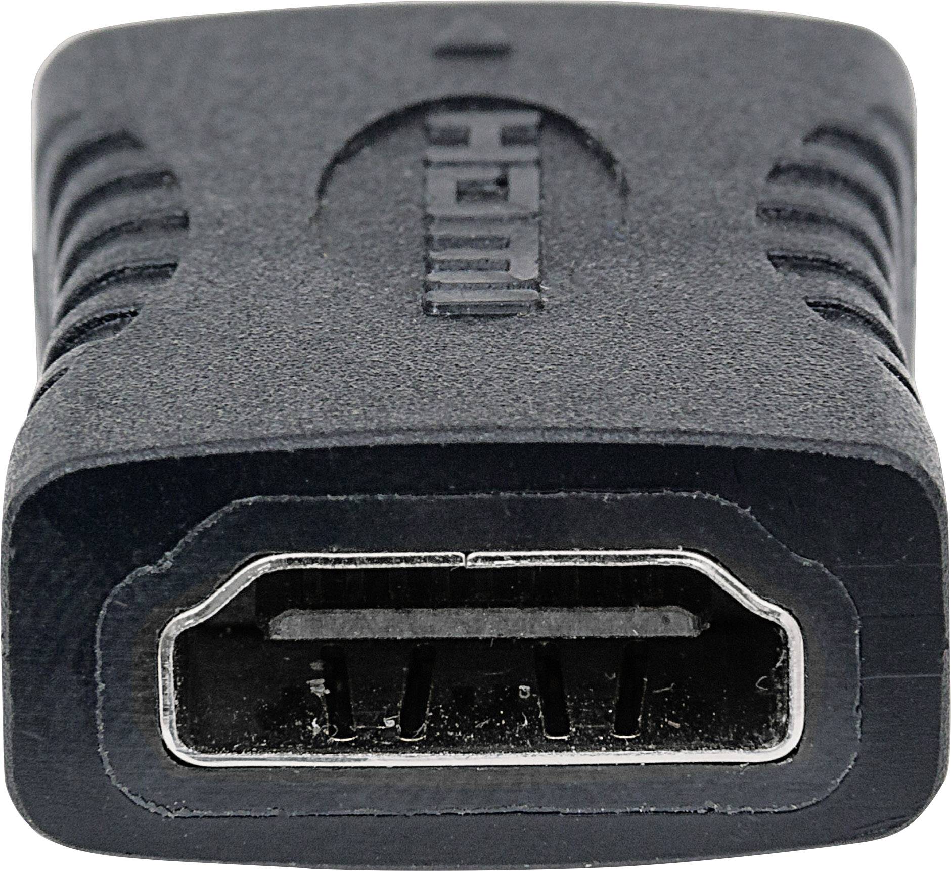 'Nahaufnahme eines HDMI-Anschlusses, der auf einem schwarzen Adapter befestigt ist. Der Adapter hat eine strukturierte Oberfläche.'