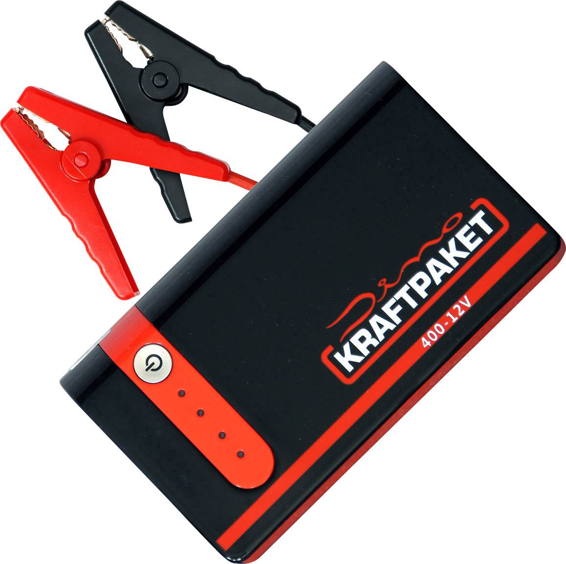 Ein schwarzes und rotes Starthilfegerät mit Klemmen, bezeichnet mit 'Kraftpaket', links die schwarzen und roten Batterieklammern.