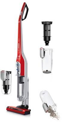 Ein roter, kabelloser Staubsauger mit Zubehör: Filter, Staubbehälter und eine umgestürzte Staubbox, die Schmutz freisetzt.