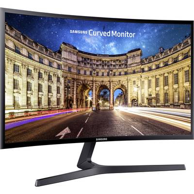 Ein Samsung Curved Monitor zeigt ein Foto eines historischen Gebäudes mit nächtlichem Sternenhimmel und leuchtenden Straßenlichtern.