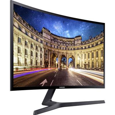 Ein gebogener LED-Monitor zeigt ein nächtliches Großstadtbild mit beleuchteten Gebäuden und einem sternenklaren Himmel.