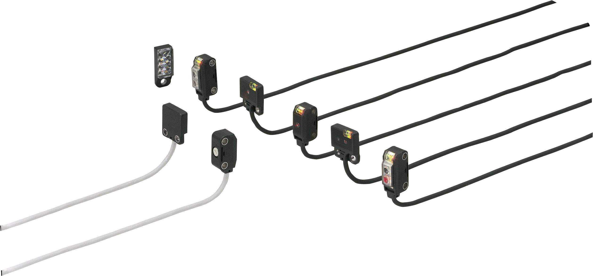 Fünf schwarze Sensoren mit Kabeln in einer Reihe angeordnet. Ein Sensor mit weißen Kabeln liegt separat. Im Hintergrund ein kleiner Anschlussstecker.