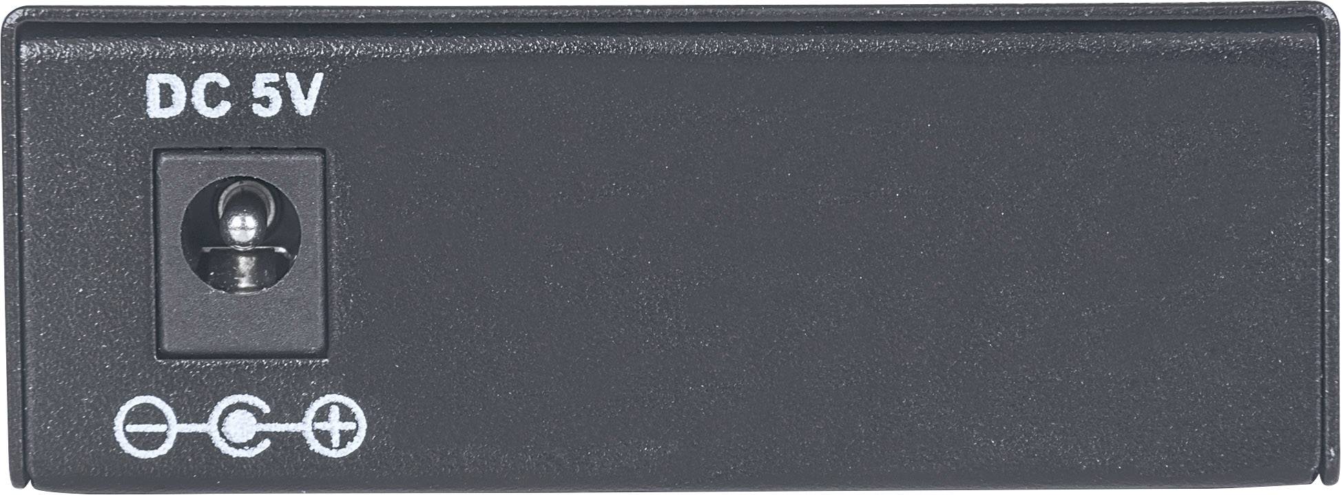 Schwarzes Ladegerät mit Anschlusspunkt und Beschriftung 'DC 5V', zeigt die Polarität für den Stromanschluss an.