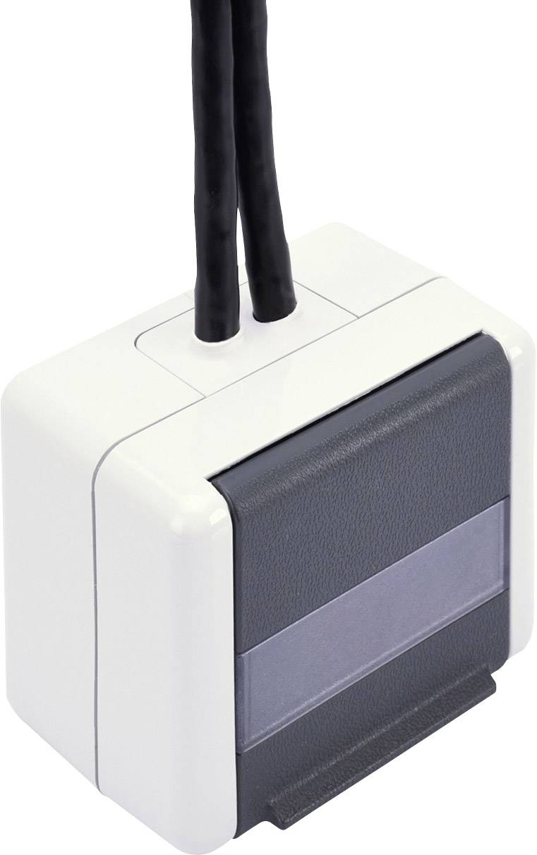 Quadratisches, weißes elektrisches Gerät mit zwei Kabeln, schwarzer Front und durchsichtiger Leiste, vermutlich ein Sensor oder Schalter.