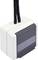 Quadratisches, weißes elektrisches Gerät mit zwei Kabeln, schwarzer Front und durchsichtiger Leiste, vermutlich ein Sensor oder Schalter.