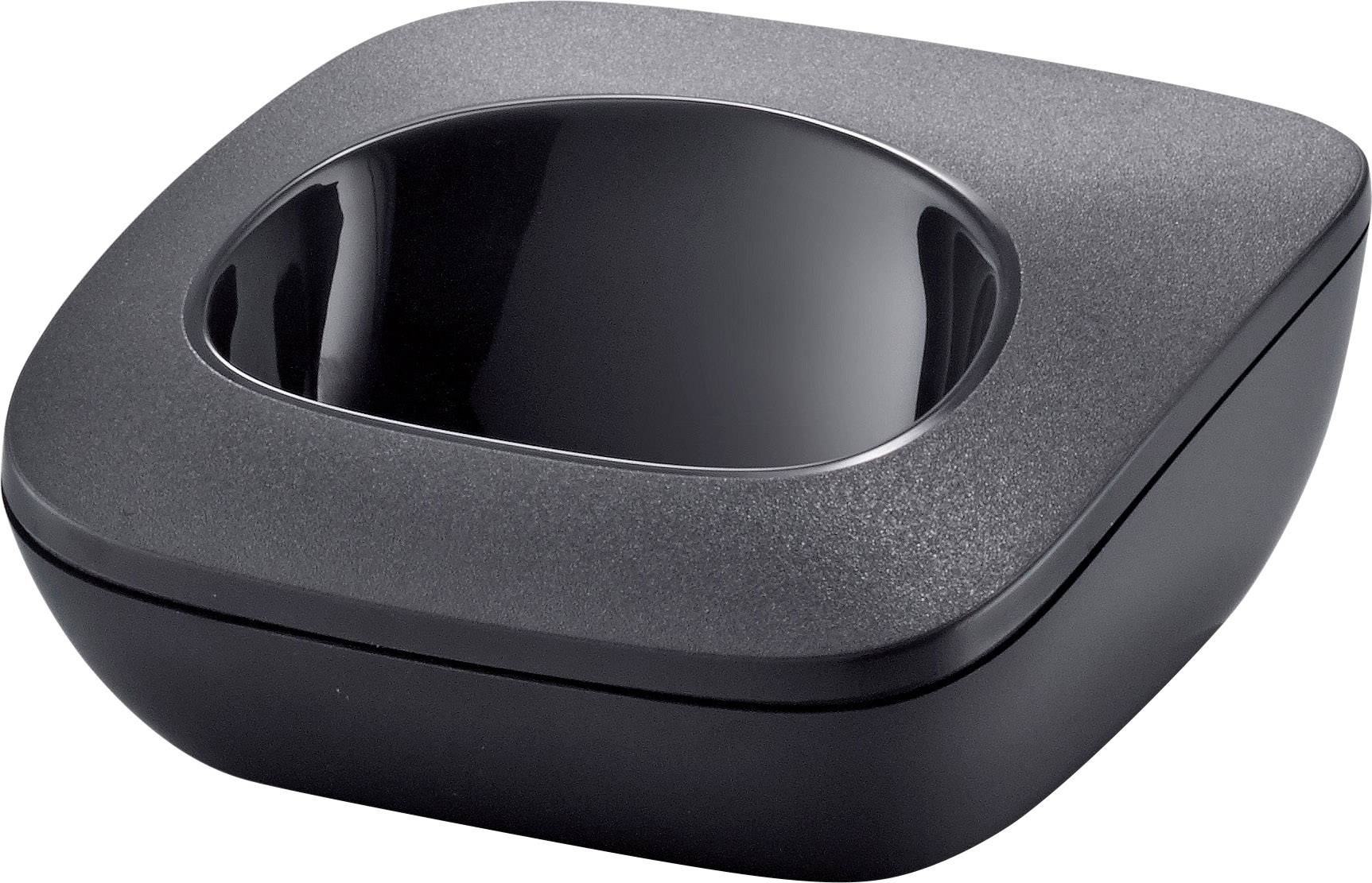 Ein quadratisch geformter, schwarzer Behälter mit abgerundeten Ecken und einer glänzenden, vertieften Mulde in der Mitte.