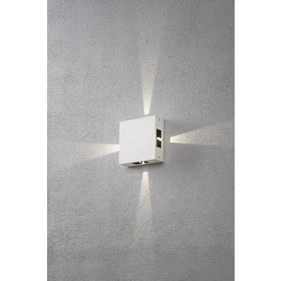 Weiße Wandleuchte strahlt Licht nach oben und unten auf graue Wand, erzeugt geometrisches Muster. Modernes, minimalistisches Design.