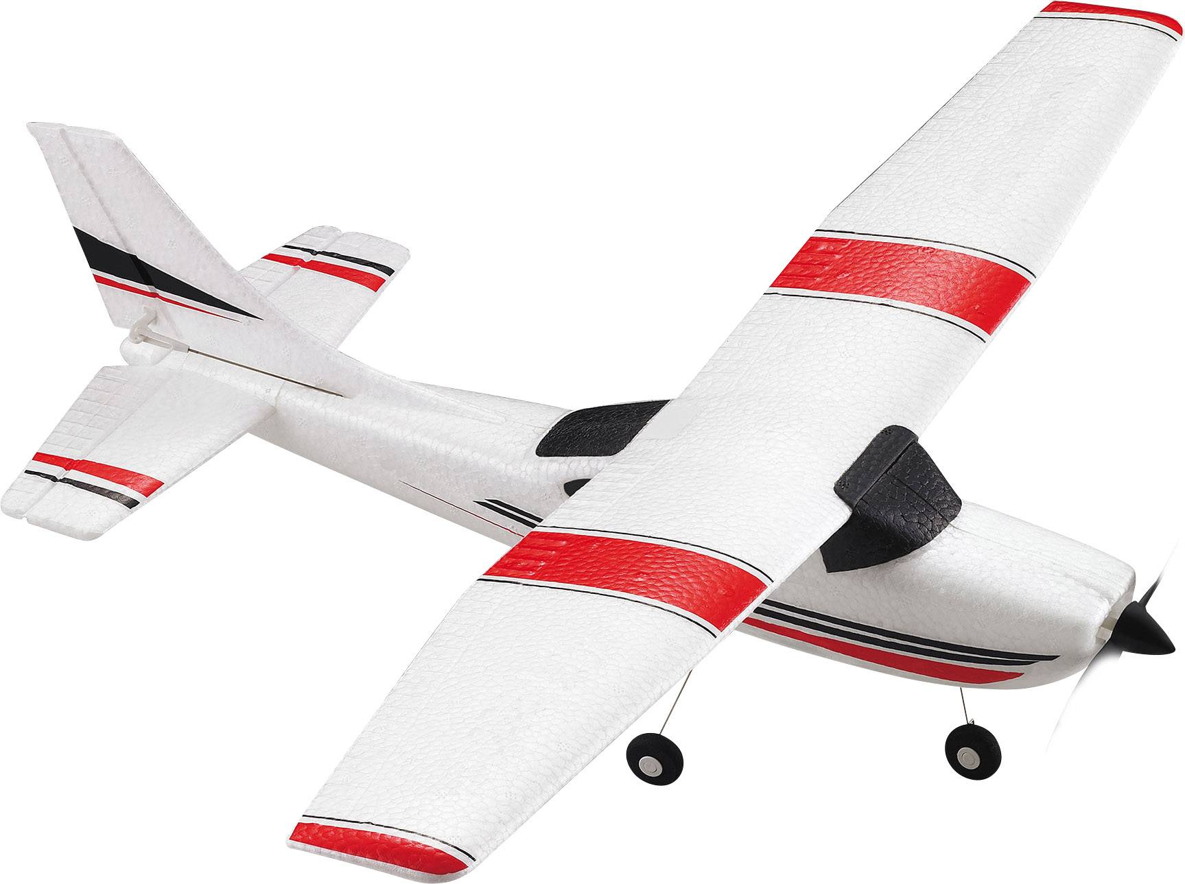 Ein Modellflugzeug mit weißen Flügeln und roten Streifen. Es hat ein Propeller an der Front und zwei Räder unten.