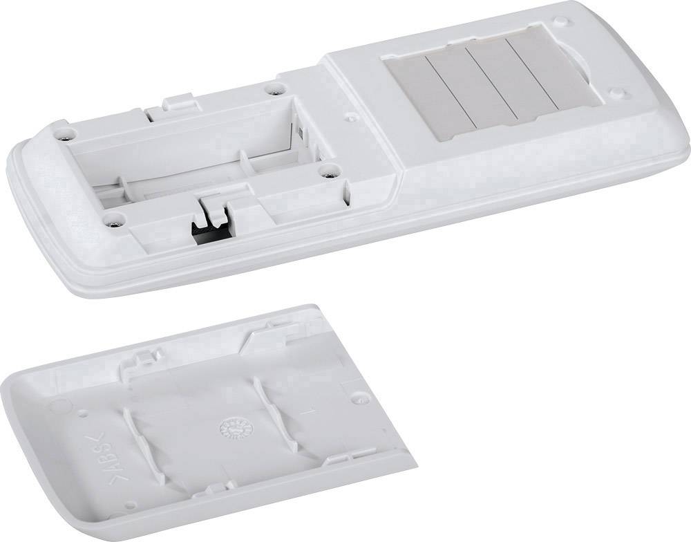 Weiße Kunststoff-Batterieabdeckung eines elektronischen Geräts, daneben liegend. Batterieklemme und Schlitze sichtbar.