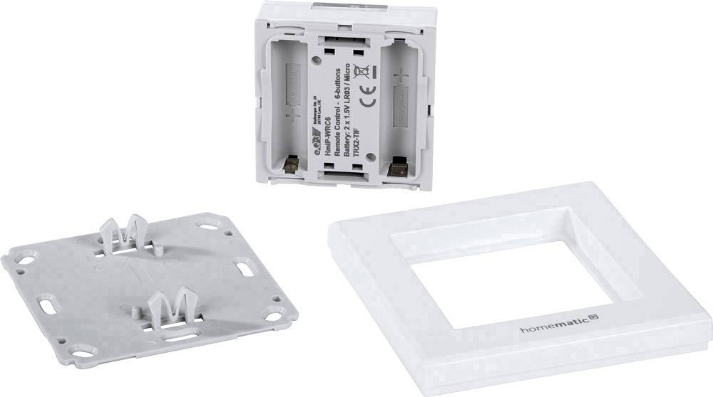 Einzelteile eines Homematic IP Schalters: Rahmen, Befestigungsplatte und Schalterelement.