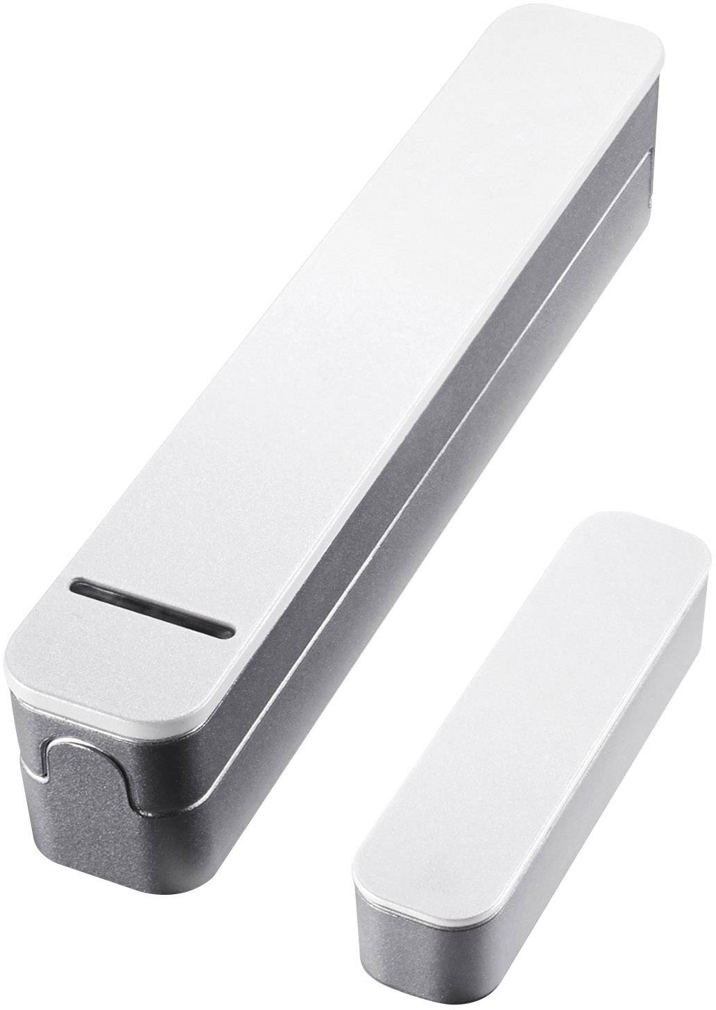 Zwei silberne, längliche Metallboxen, eine größer mit einem Schlitz oben, die andere kleiner, nebeneinander liegend.