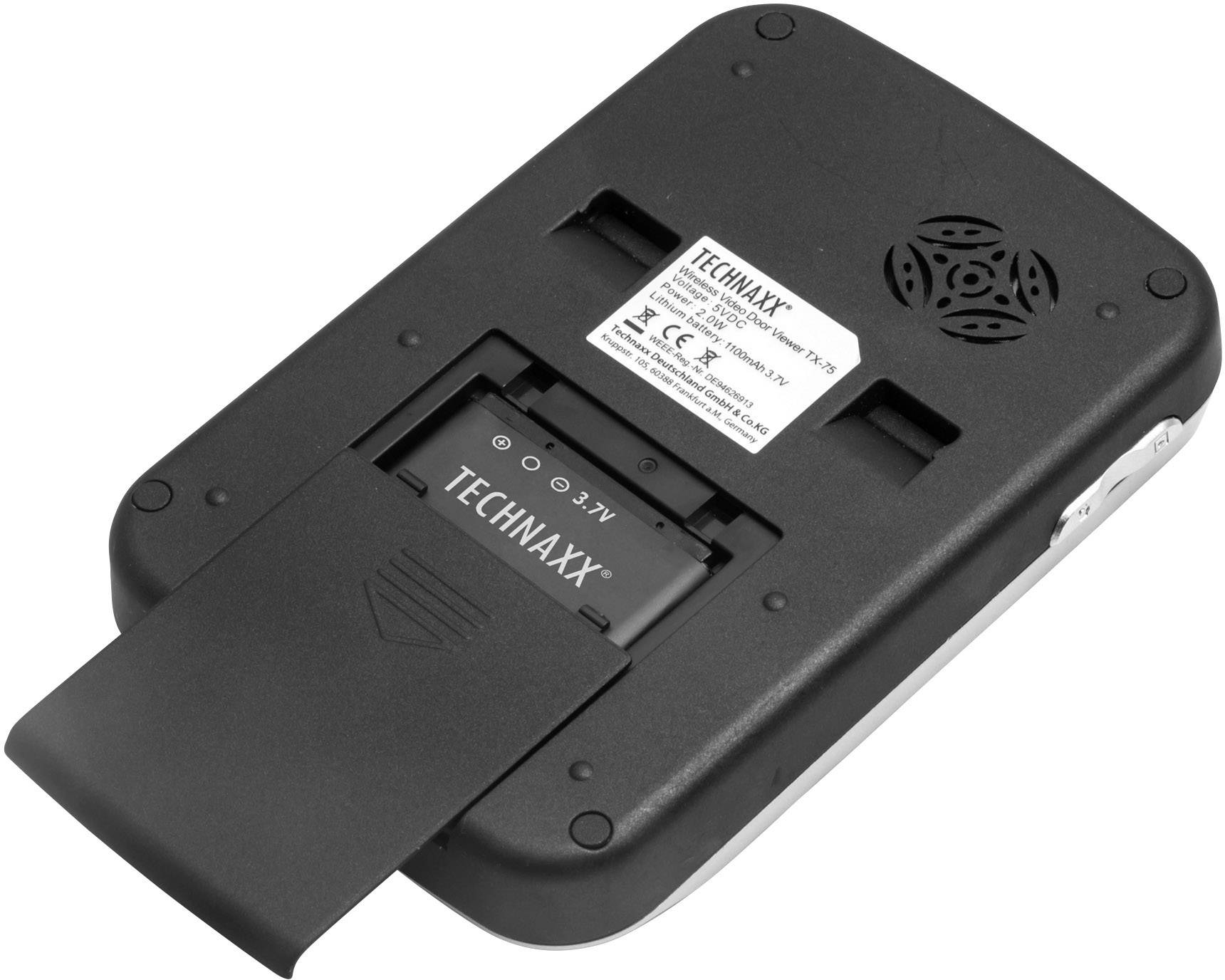 Rückseite eines schwarzen Geräts mit offenem Batteriefach und Technaxx-Batterie. Oben ist ein Etikett mit technischen Spezifikationen.