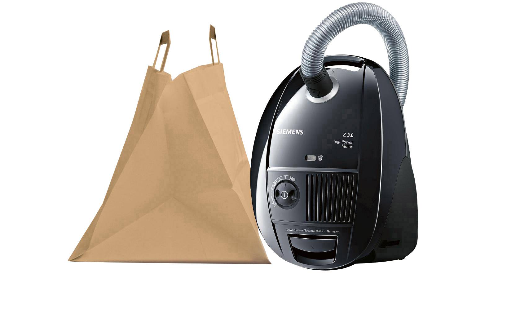 Ein schwarzer Staubsauger neben einem großen, braunen Staubsaugerbeutel.