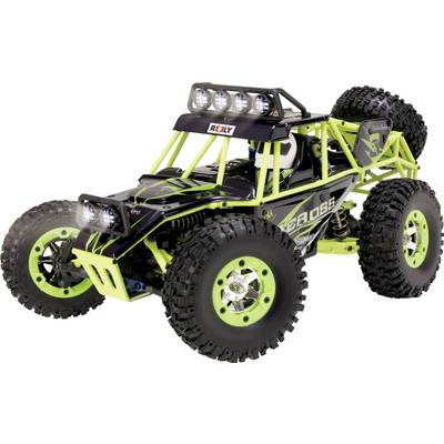 Ein ferngesteuertes, gelb-grünes Offroad-Auto mit großen Reifen und robustem Rahmen, geeignet für unwegsames Gelände.