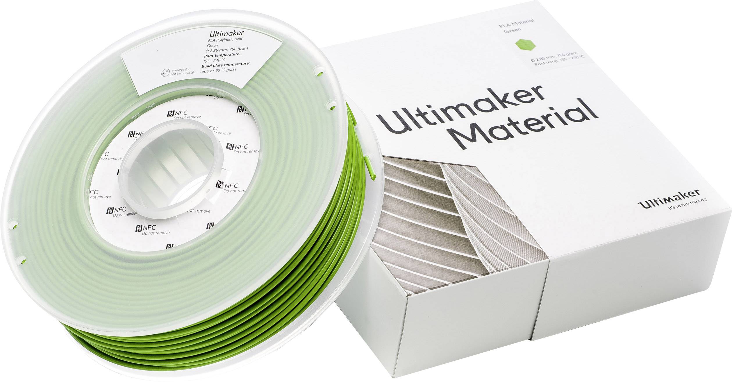 Grüne Filamentrolle von Ultimaker, geeignet für 3D-Druck, neben der dazugehörigen Verpackung mit Aufschrift 'Ultimaker Material'.