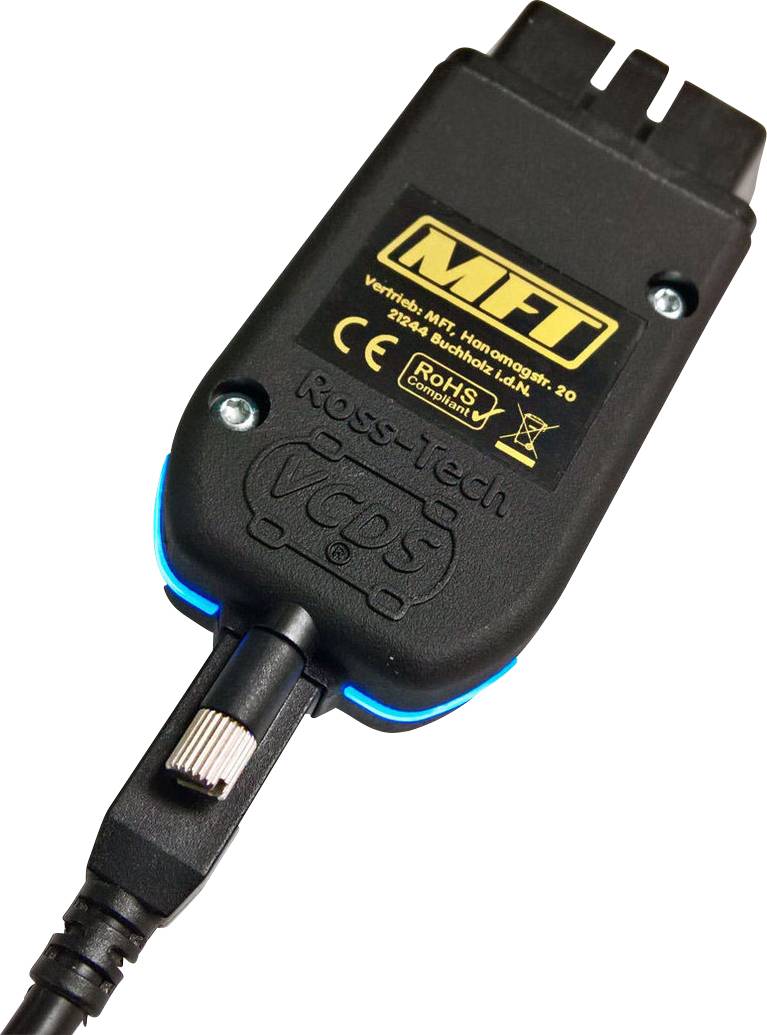 Ein schwarzer OBD-II-Diagnoseadapter, beschriftet mit 'Ross-Tech VCDS', hergestellt von 'MFT'. Steckverbinder und LED-Anzeige erkennbar.