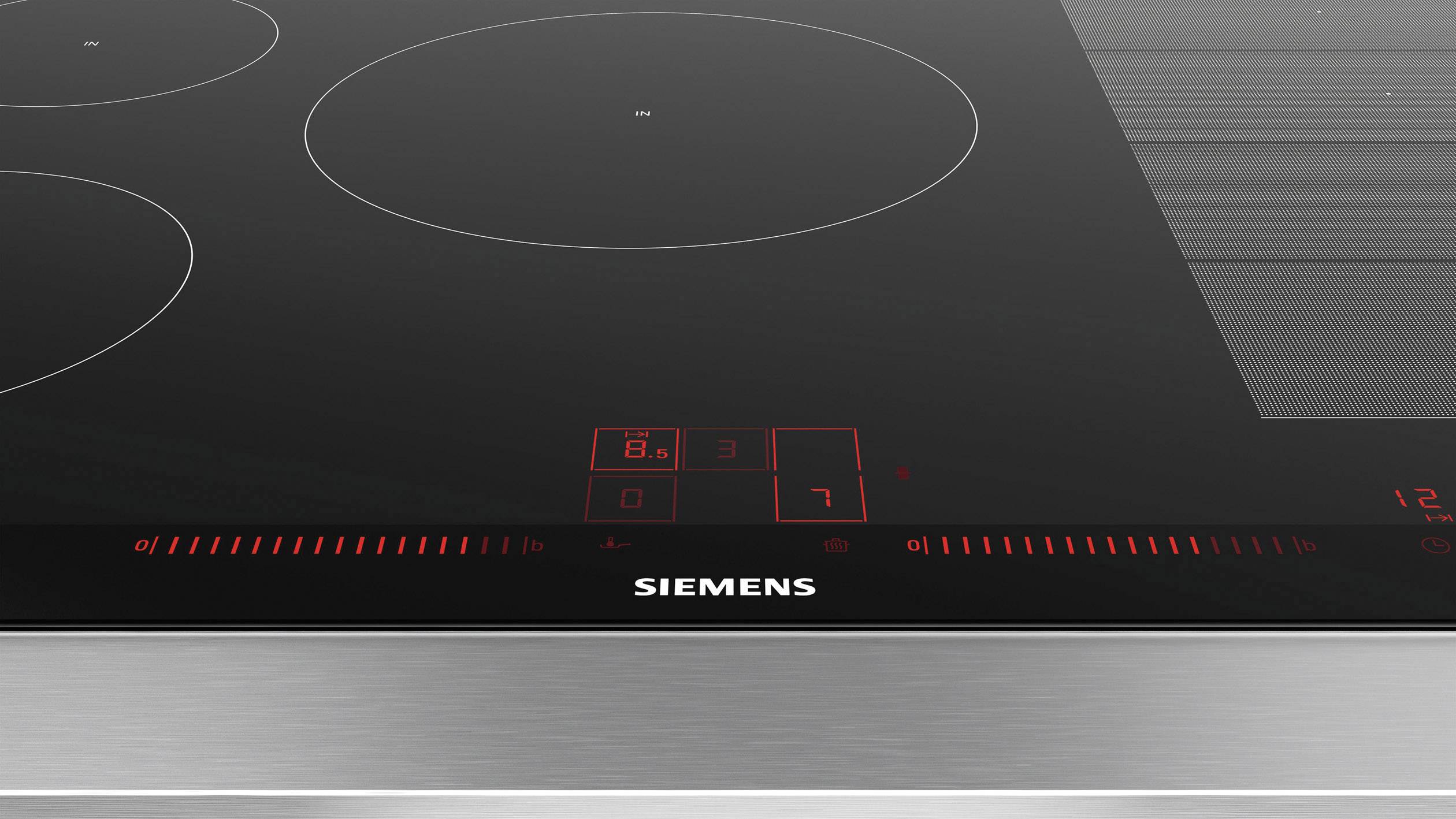 Ein moderner Siemens-Induktionskochfeld mit digitaler Anzeige und Kochzonen für präzises und effizientes Kochen.