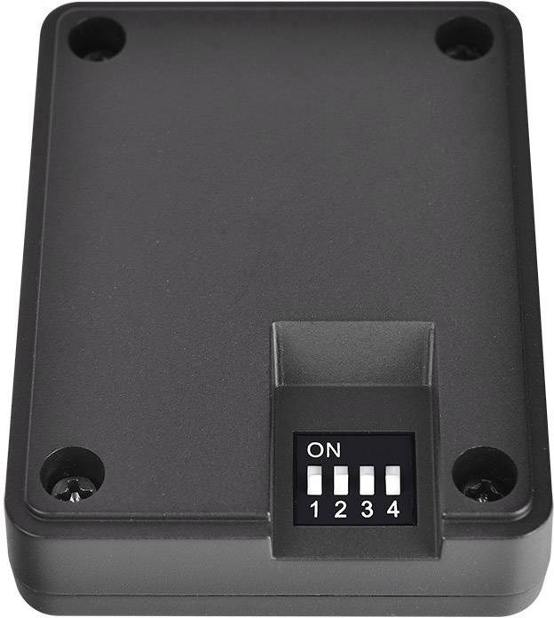 Ein schwarzer Kasten mit vier Schraublöchern. Unten ist ein Schalter mit der Aufschrift 'ON' und vier numerierten Schaltern (1-4).
